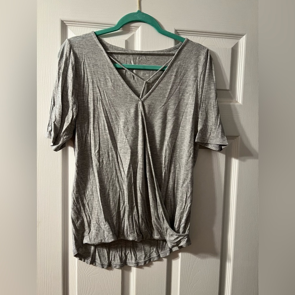Maurice’s gray shirt